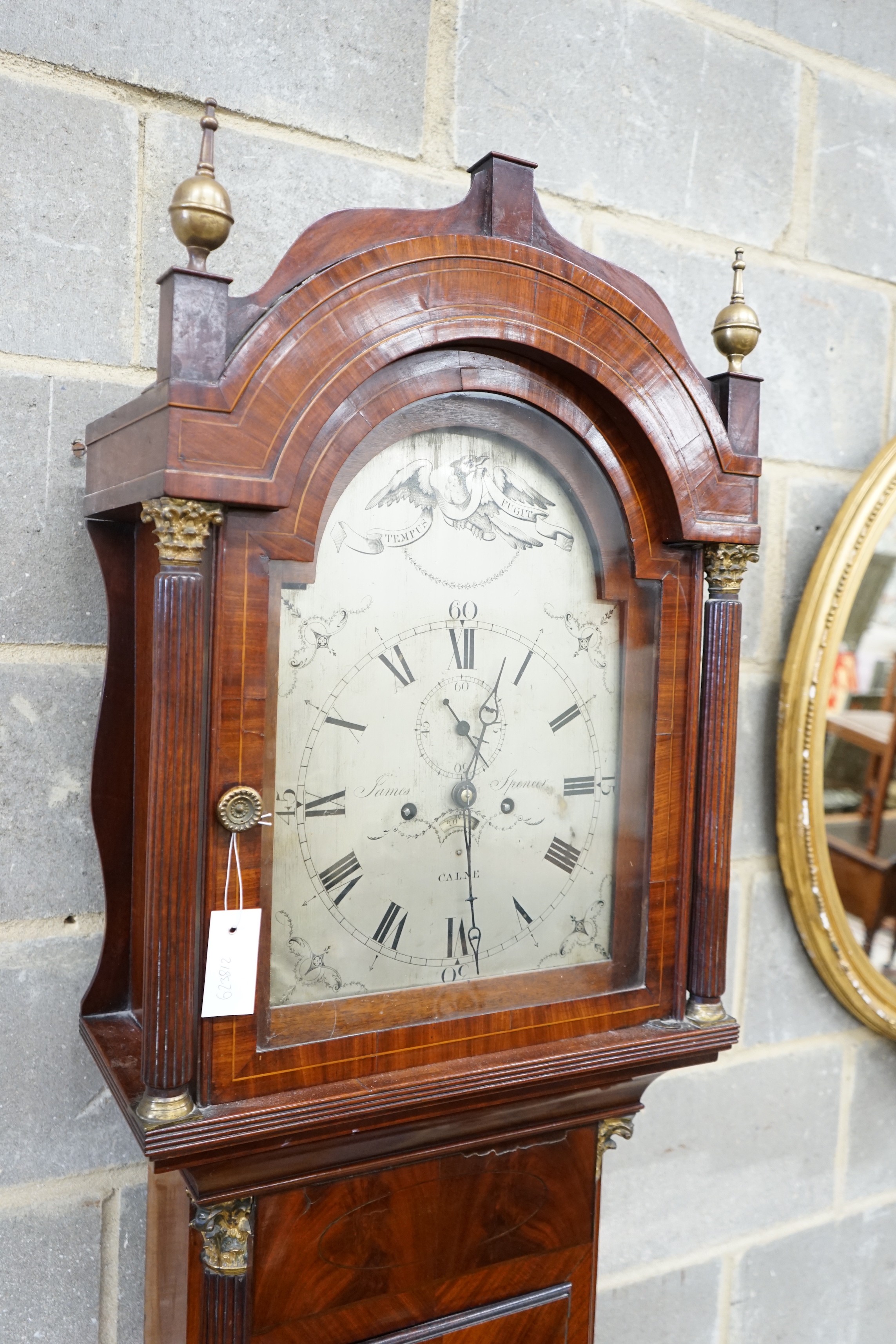 An early 19th century mahogany eight day longcase clock marked James Spencer, Calne, height 220cm